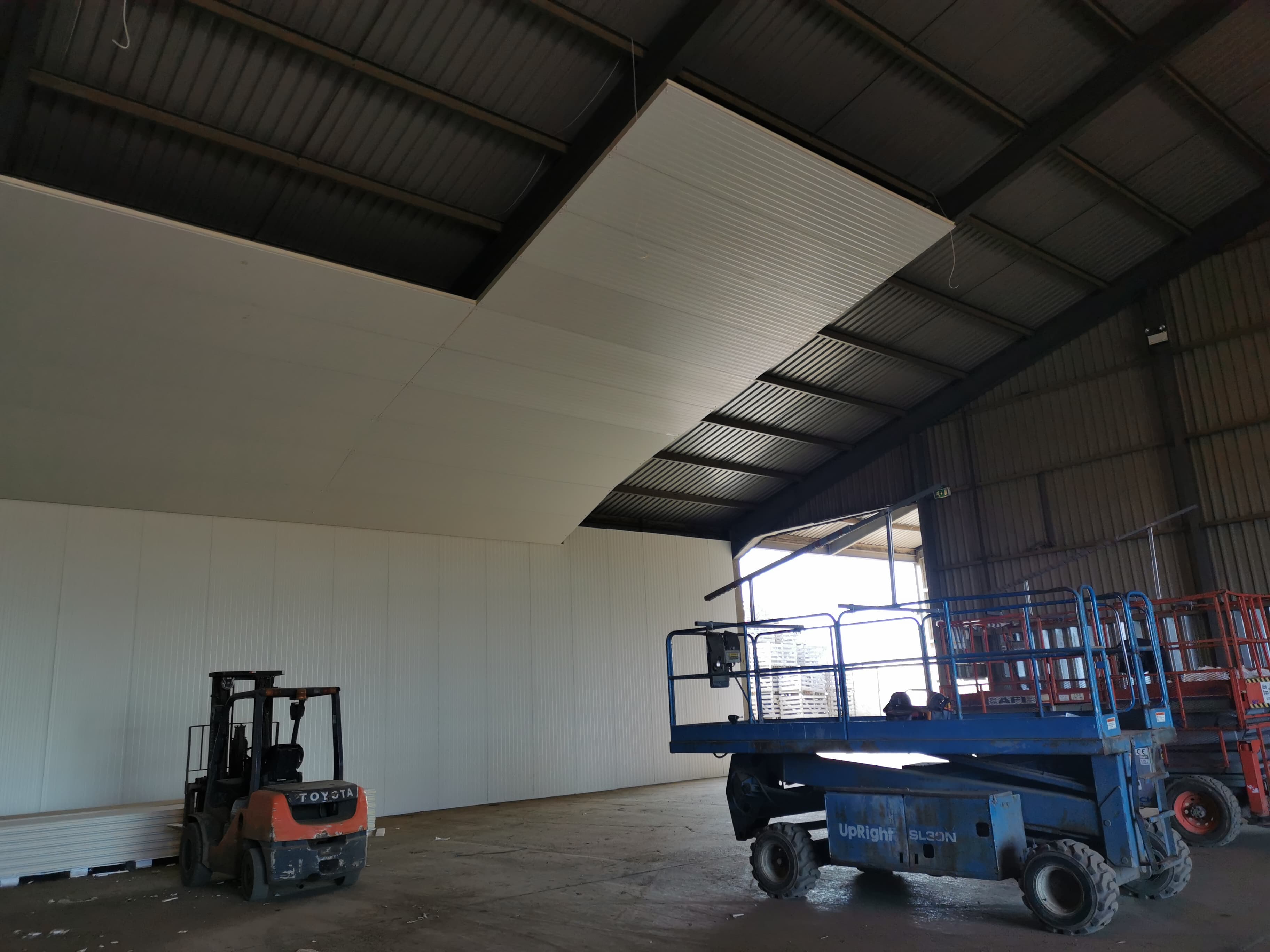 Insulated panel installation inside a large cold storage warehouse