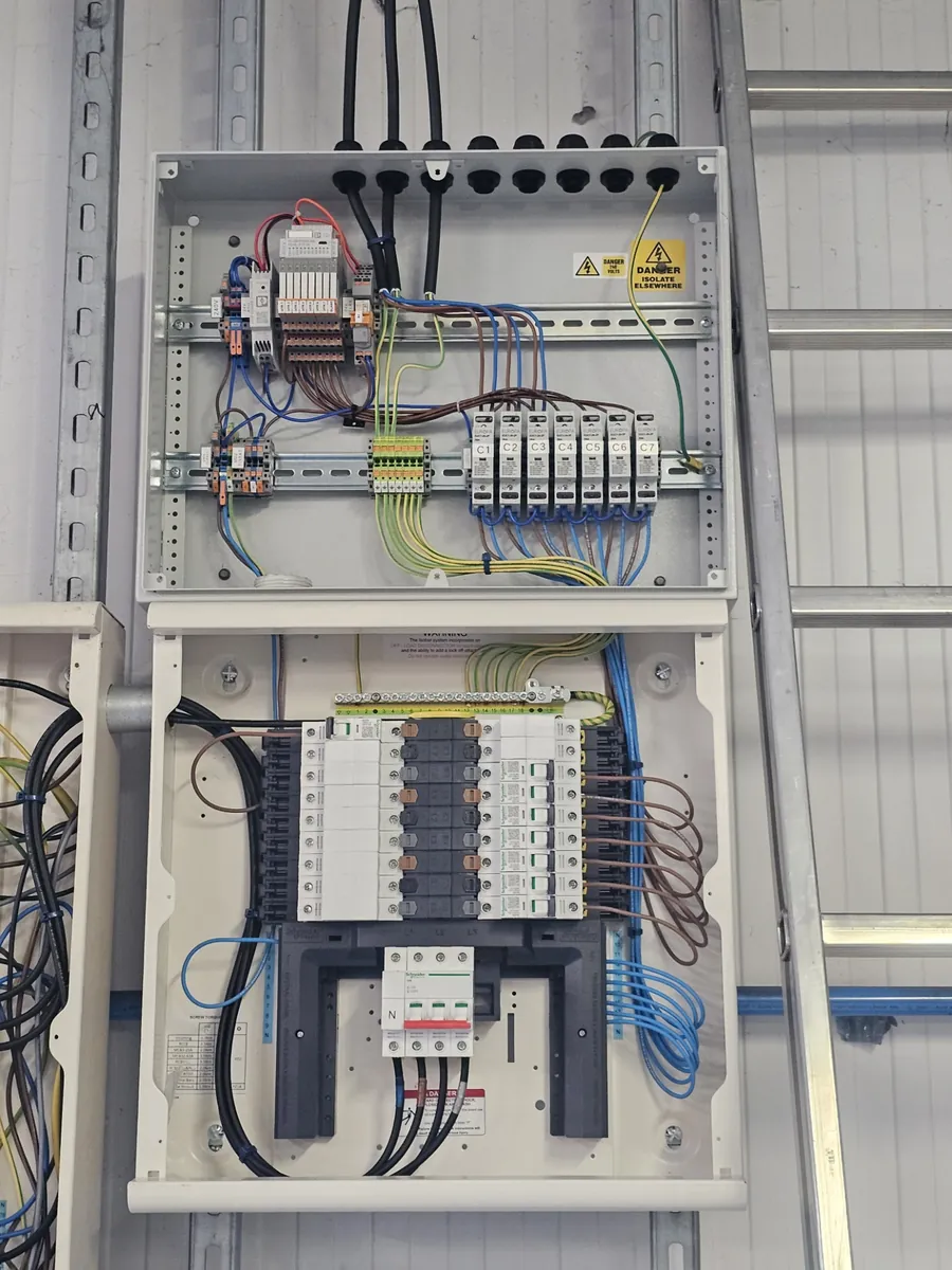 New commercial three-phase distribution board for a solar PV system, with a control and terminal section above, installed by PPM Electrical in Lincolnshire